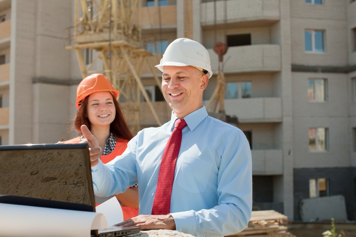 two civil engineers on job site
