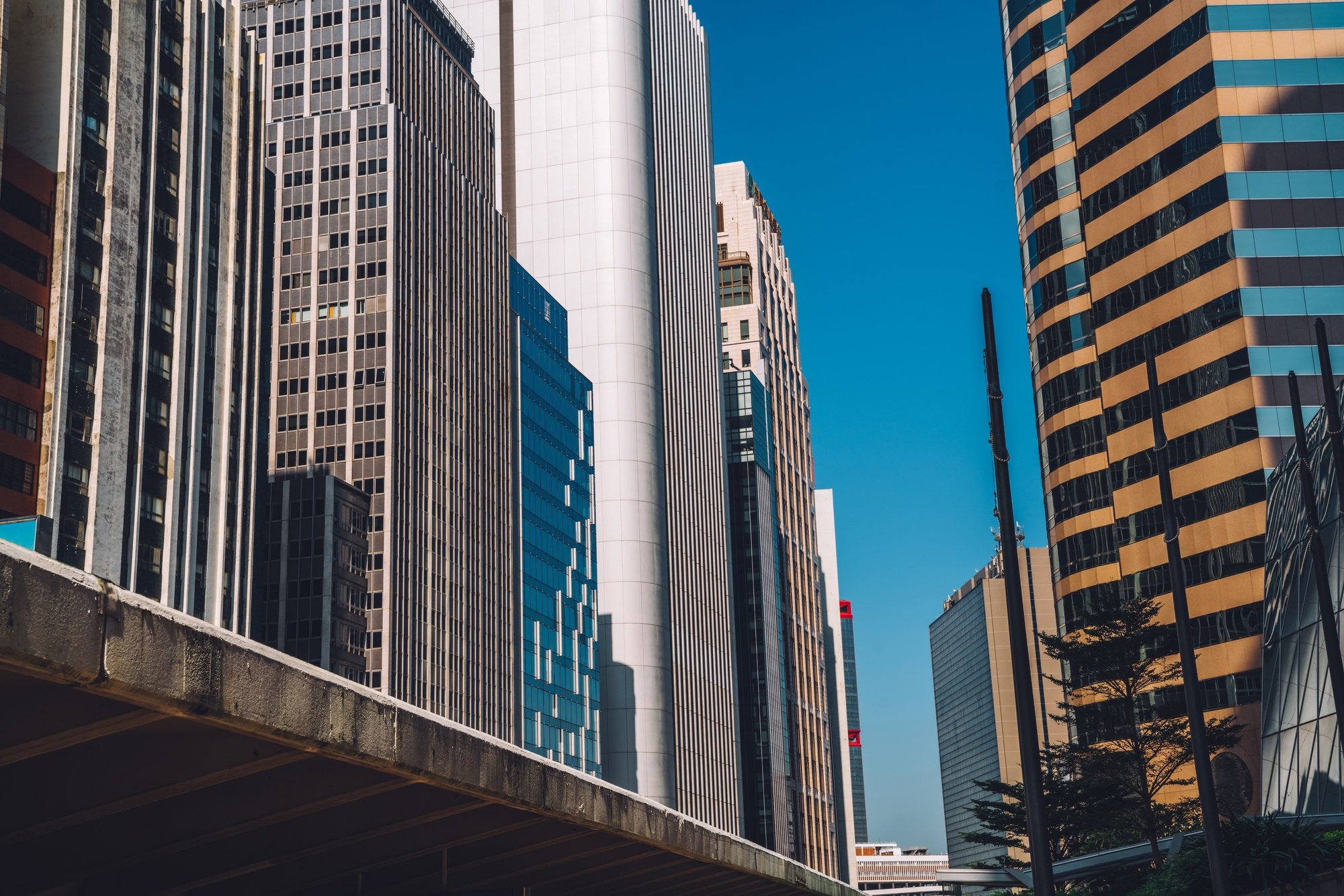 Modern business district of megalopolis with tall skyscrapers and rental commercial apartments,